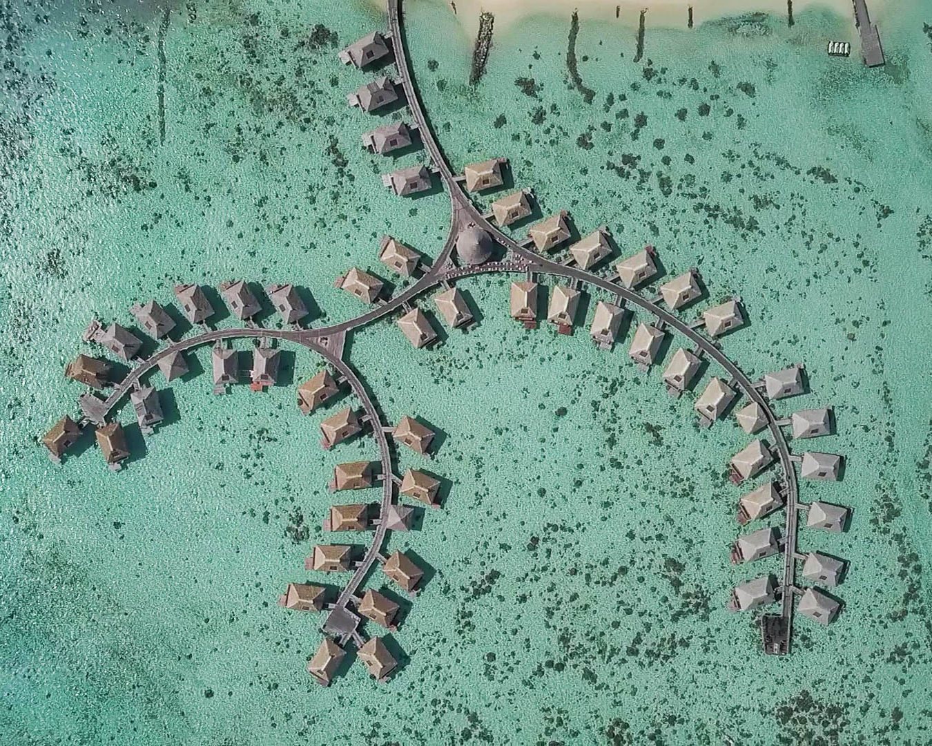 drone shot, lagoon, overwater bungalow