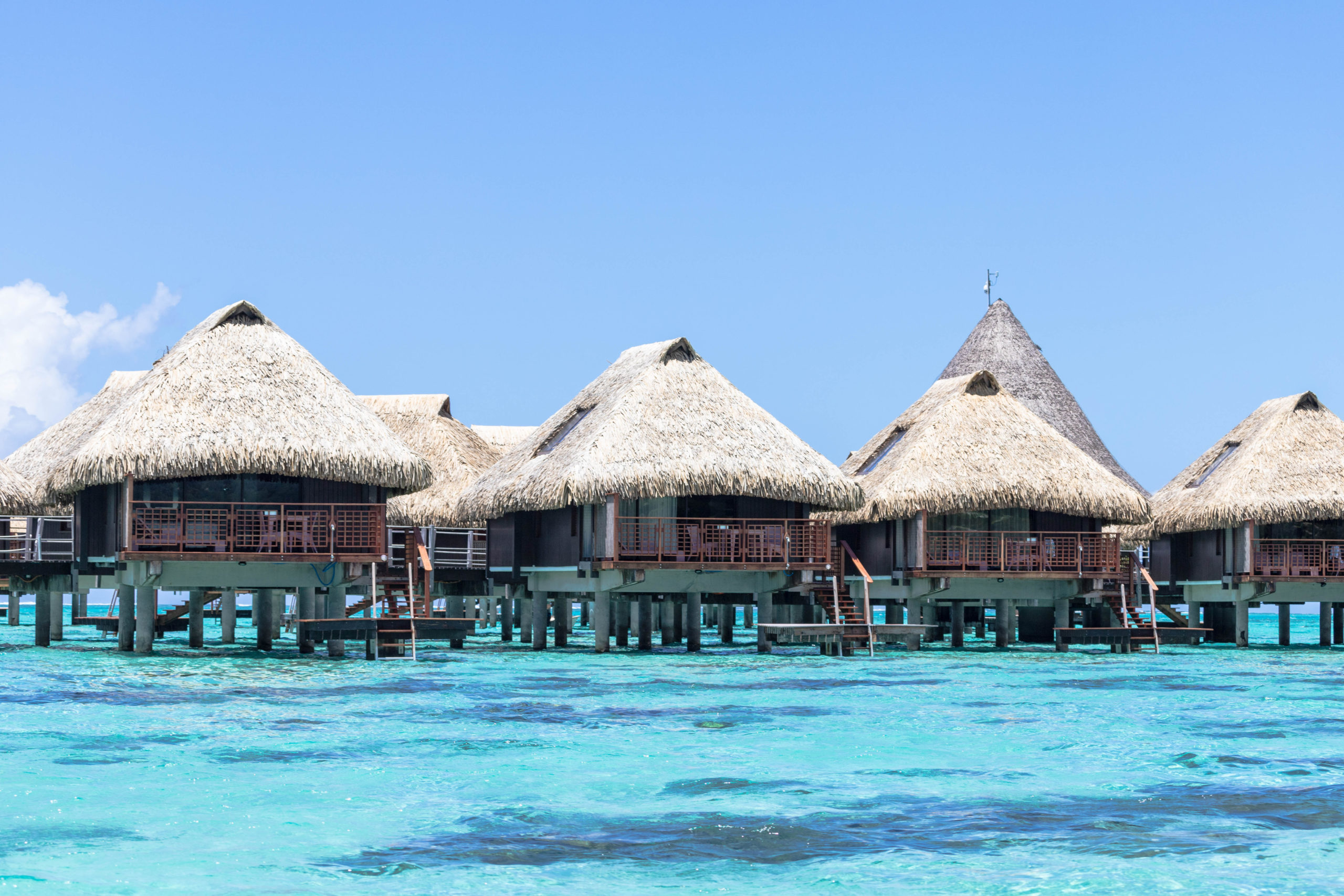 overwater bungalow, turquoise water, french polynesia